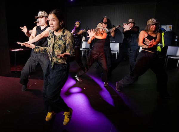 Hariata Moriarty performing a song with the cast of Waenga